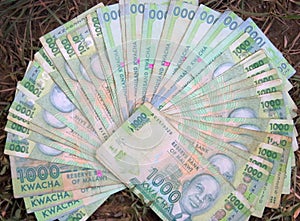 Hundred bucks in terms of Malawian Kwacha in the largest denominations