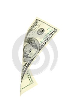 Hundred dollar bill falling on white background.