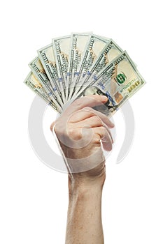 Hundred dollars bills in man`s hand isolated on white. Hand up with American 100 dollars cash money note