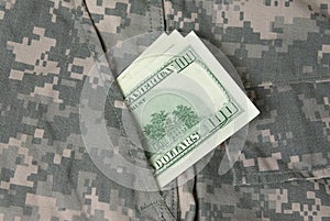 Hundred dollars in us army uniform pocket