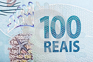 A hundred reais bill close up photo