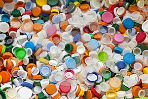 Hundreds of Brightly Colored Plastic Bottle Caps photo