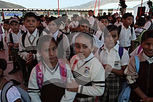 LIMA, PERU - MARCH 01, 2012: HUNDREDS OF CHILDREN START THE SCHOOL YEAR IN ONE OF THE DISTRICTS OF THE CITY OF LIMA. PRESENTIAL