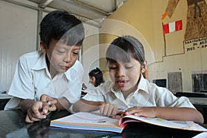 LIMA, PERU - MARCH 01, 2012: HUNDREDS OF CHILDREN START THE SCHOOL YEAR IN ONE OF THE DISTRICTS OF THE CITY OF LIMA. PRESENTIAL