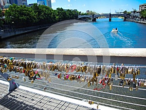Hundreds of love locks are attached to landmark Seafarers Bridge in Melbourne.