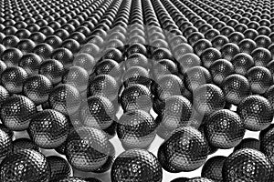 Hundreds of steel golf balls lined up on a mirror