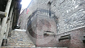 Hundreds of years old wall built by piling up old stones