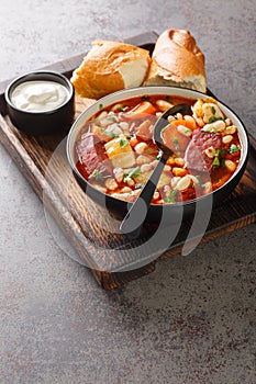 Hungarian Bean Goulash Soup Babgulyas closeup in the plate. Vertical