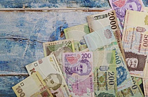 Hungarian forint banknotes and Ukrainian hryvnias currency money