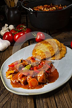 Hungarian goulash with potato pancakes