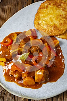 Hungarian goulash with potato pancakes