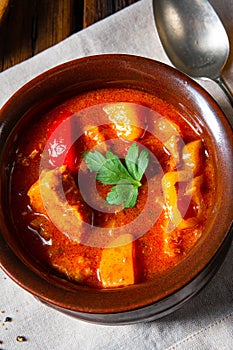 Hungarian goulash soup in a cauldron or pot