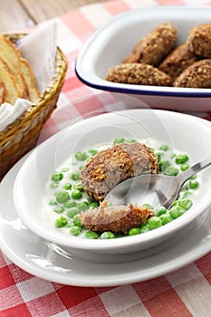 Hungarian green peas stew and fried meatball