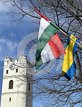 Hungarian national flag and the church tower