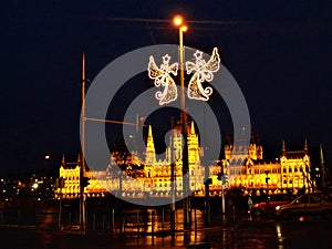 The Hungarian Parliament Building in Budapest city. Christmas, lights and night
