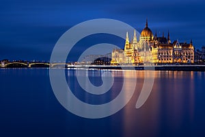 Hungarian Parliament Building in Budapest at night with Danube river