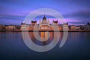 Hungarian Parliament Building in Budapest at sunset with Danube river