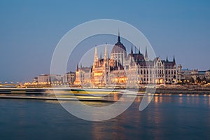 Hungarian Parliament building and Danube River in the Budapest city in the evening. A sample of neo-gothic architecture