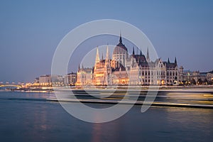 Hungarian Parliament building and Danube River in the Budapest city in the evening. A sample of neo-gothic architecture