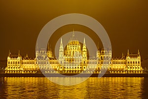 Hungarian parliament and Danube river by night in Budapest