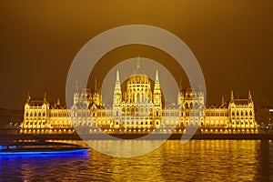Hungarian parliament and Danube river by night in Budapest
