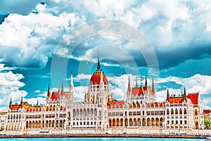 Hungarian Parliament at daytime. Budapest. View from Danube riverside photo