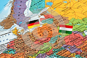 Hungary and Germany flag pins on map, political concept image, central europe