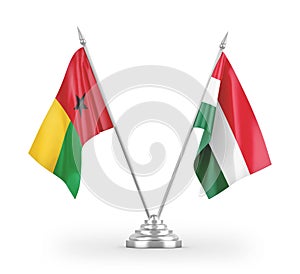 Hungary and Guinea-Bissau table flags isolated on white 3D rendering