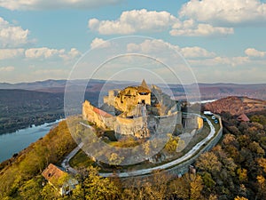 Hungary - The historical Visegrad Castle near Danube river from drone view at sunset