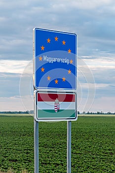 Hungary Magyarorszag border sign and flag of Hungary on the Austria - Hungary border
