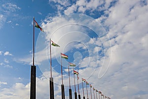 Hungary National Flag Waving on pole against deep blue sky background