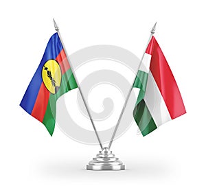 Hungary and New Caledonia table flags isolated on white 3D rendering