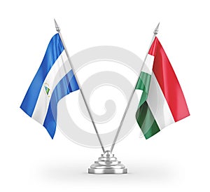 Hungary and Nicaragua table flags isolated on white 3D rendering
