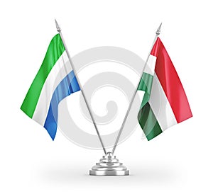 Hungary and Sierra Leone table flags isolated on white 3D rendering