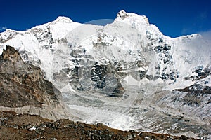 Hungchhi peak and Chumbu peak above Ngozumba glacier photo
