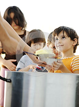 Hungry children in refugee camp