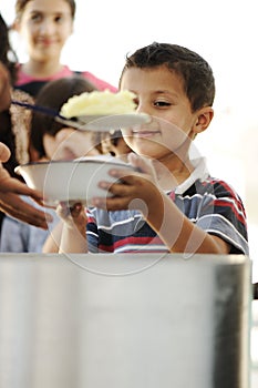 Hungry children in refugee camp