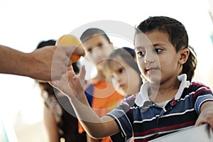 Hungry children in refugee camp