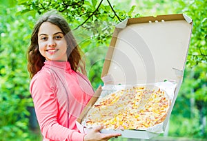 Hungry girl pizza box nature background, picnic time concept