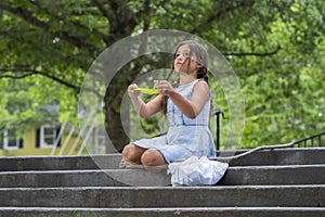 A Hungry Homeless Abandoned Runaway Child Looks For Food And Shelter While Holding An Empty Plate Of Food