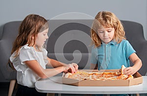 Hungry kids eating pizza. Children preparing to eat fresh pizza.