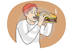 Hungry man eating burger