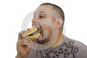 Hungry man with hamburger.