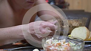 Hungry Man after Working Day Eating Soup in Home Kitchen, Chewing Food Mouth