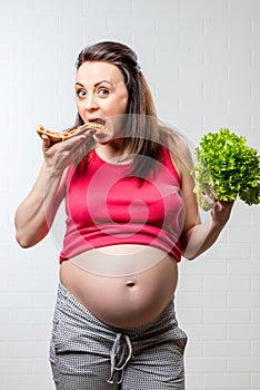hungry pregnant woman chooses the unproductive food