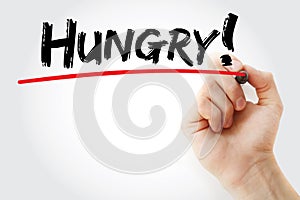 Hungry text with marker, business concept background
