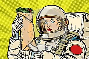 Hungry woman astronaut with Shawarma kebab