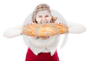 Hungry woman with bread