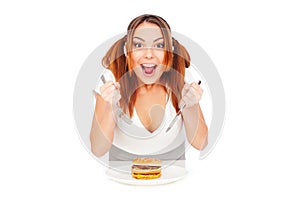 Hungry woman with burger photo