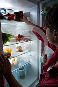 Hungry woman choosing food